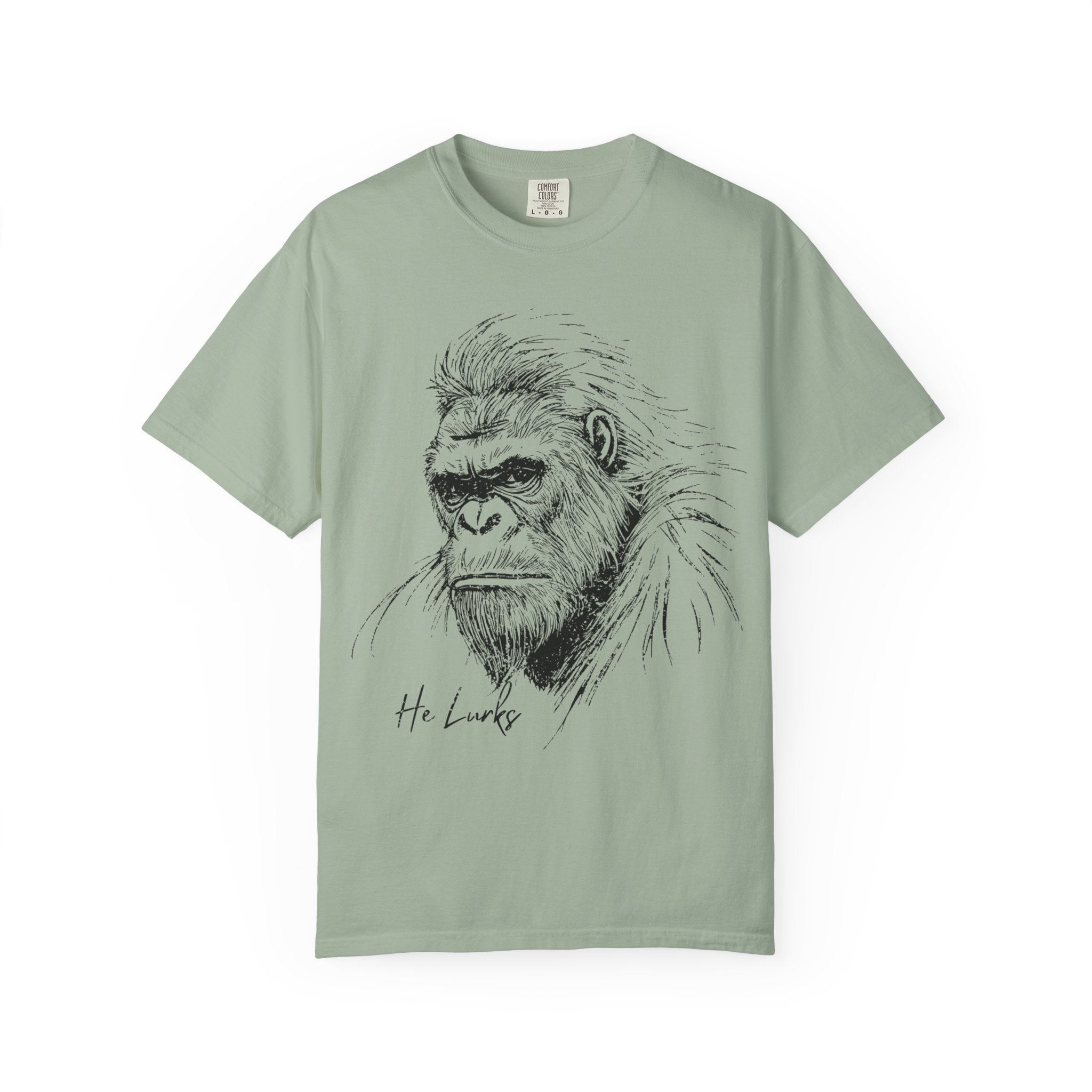 White Funny Geology T-Shirt: He Lurks - Bigfoot
